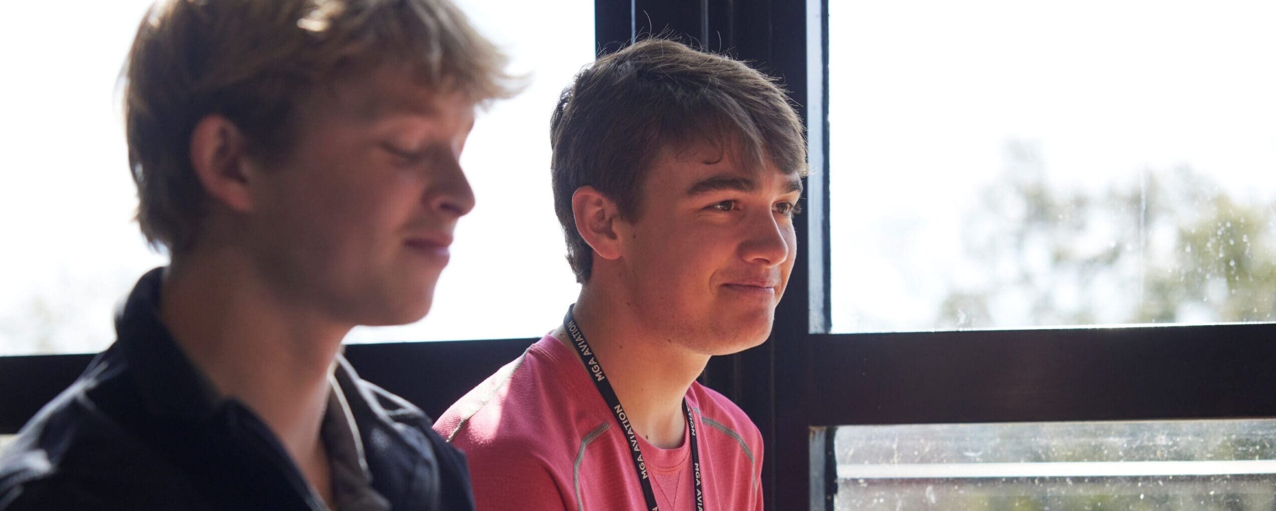 Image of two MGA students eating at GA Dining Hall.